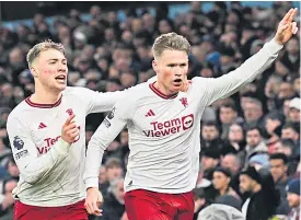  ?? — AFP photo ?? McTominay celebrates scoring the team’s second goal with Hojlund during the English Premier League match between Aston Villa and Manchester United at Villa Park in Birmingham, central England.