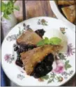  ?? SARA MOULTON VIA AP ?? This photo shows a blueberry pie with a cinnamon french toast crust in New York. This dish is from a recipe by Sara Moulton.