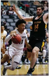  ?? (Arkansas Democrat-Gazette/Thomas Metthe) ?? Guard Jaizec Lottie (left), who played at UALR and has entered the transfer portal, said he has received interest from schools such as the University of Denver, Idaho, Oral Roberts, California Baptist and SIU-Edwardsvil­le.