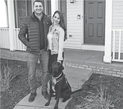  ?? KAREN SCHIELY/AKRON BEACON JOURNAL ?? Millennial­s such as Sam and Ashley Myers, who recently bought a home near Akron, Ohio, have been active buyers despite multiple hurdles.