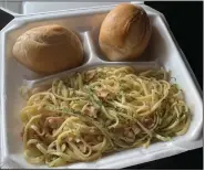  ?? (Arkansas Democrat-Gazette/Eric E. Harrison) ?? Ciao provides two rolls with its linguini in natural clam sauce.