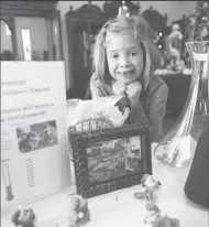  ?? BEA AHBECK/NEWS-SENTINEL FILE PHOTOGRAPH ?? McKenna Berghold, 7, collects donations for Shriners Children’s Hospital at Berghold Estate Winery on Nov. 19, 2016.