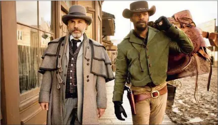  ?? PICTURE: AP PHOTO/THE WEINSTEIN COMPANY ?? SLAVE TRADE: Christoph Waltz, left, and Jamie Foxx in Django Unchained.