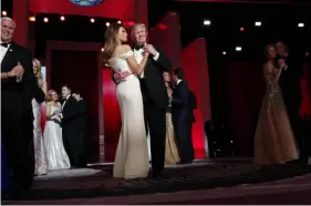  ?? Doug Mills/The New York Times ?? President Donald Trump dances with first lady Melania Trump at the Liberty Ball on Jan. 20, 2017, in Washington, D.C.