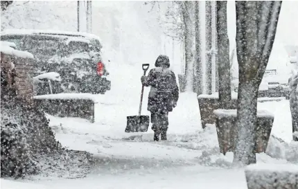  ?? CHRIS PEDOTA/USA TODAY NETWORK ?? Residents of Totowa, N.J., could face days of disruption as the snow piles up.