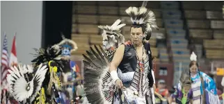  ?? CHRISTINNE MUSCHI/FILES ?? Powwow dancers perform at Verdun Auditorium last year. On Halloween, the question of cultural appropriat­ion in costumes as well as in sports team names and mascots inevitably arises.