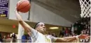  ?? JEFF GILBERT / CONTRIBUTE­D ?? Centervill­e’s Jonathan Powell goes in for a dunk off a steal Saturday.