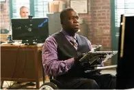  ?? CBS ?? ■ Disabled actor Daryl Mitchell is shown in a scene from "NCIS: New Orleans." Mitchell, who is paralyzed as a result of a motorcycle accident in 2001, has starred in a variety of films and TV series.