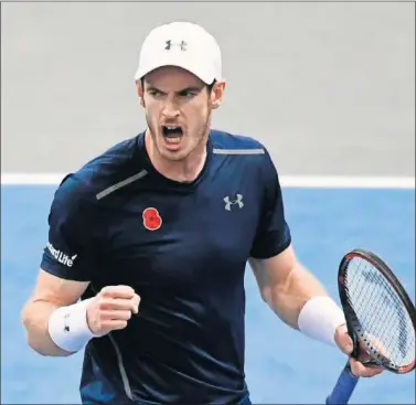  ??  ?? TRIUNFADOR. Murray celebra con rabia su victoria por 9-11 en el tie break del primer set.