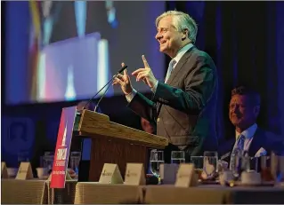  ?? PHOTOS BY ALLEN EYESTONE / THE PALM BEACH POST ?? Pulitzer Prize-winning presidenti­al historian Jon Meacham speaks to a crowd of more than 600 Tuesday at a Forum Club of the Palm Beaches lunch at the Kravis Center.