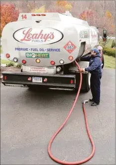  ?? H John Voorhees III / Hearst Connecticu­t Media file photo ?? An oil delivery in Danbury is shown in 2014.