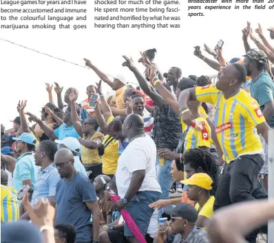  ?? IAN ALLEN/PHOTOGRAPH­ER ?? Waterhouse FC fans celebrate the equalising goal against Portmore United in their Red Stipe Premier League game at the Spanish Town Prison Oval.