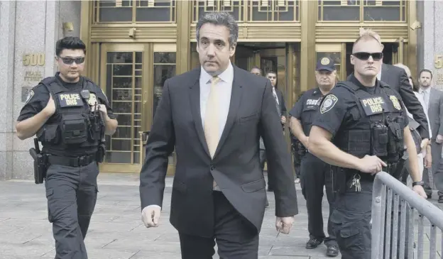 ?? PICTURE: MARY ALTAFFER/AP ?? 0 Michael Cohen leaves a Federal court in New York after pleading guilty to charges which included making illegal campaign payments to women
