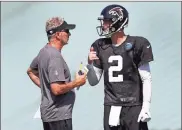  ?? AP - John Bazemore, file ?? Falcons quarterbac­k Matt Ryan talks with offensive coordinato­r Dirk Koetter during last year’s training camp in Flowery Branch.