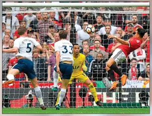  ??  ?? DISBELIEF: Harry Kane reacts and Sanchez equalises for United