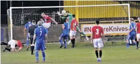  ?? Pictures by John Driscoll ?? ● Action in the Skem goalmouth against Wythenshaw­e Town