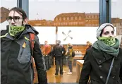  ?? FREDERICK FLORIN/GETTY-AFP ?? Global environmen­tal movement Extinction Rebellion activists demonstrat­e against a Black Friday event in front of an Apple store in Strasbourg, eastern France.