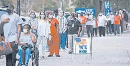  ?? MICHAEL HOLAHAN/THE AUGUSTA CHRONICLE ?? Voters pack an election site this week in Augusta, Georgia. Black Georgians are flocking to the polls and waiting in lines for several hours to cast their ballots in early voting.