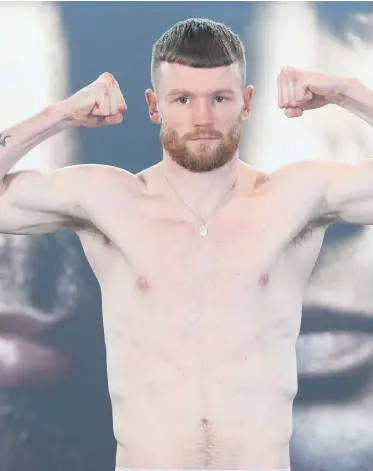  ??  ?? Top shape: James Tennyson weighs in for tonight’s big fight