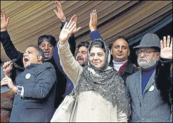  ?? ANI PHOTO ?? People’s Democratic Party chief Mehbooba Mufti waves to the supporters at a youth convention in Srinagar on Sunday.