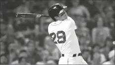  ?? CHARLES KRUPA/AP ?? BOSTON RED SOX’S BOBBY DALBEC follows through on a tworun single during the fourth inning of the team’s game against the Tampa Bay Rays at Fenway Park on Wednesday in Boston.