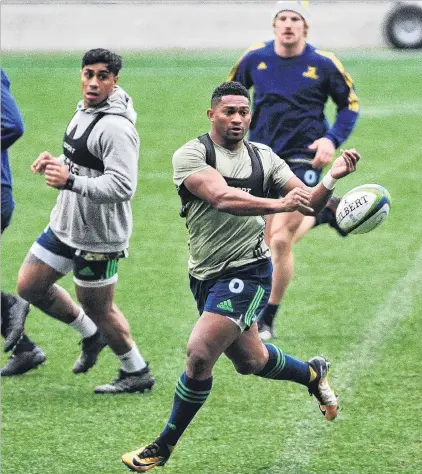  ?? PHOTO: CHRISTINE O’CONNOR ?? Leaving and staying . . . Highlander­s winger Waisake Naholo moves the ball while Malakai Fekitoa (left) and James Lentjes look on during training at Forsyth Barr Stadium yesterday.