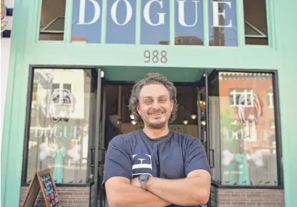  ?? JOSH EDELSON/AFP VIA GETTY IMAGES ?? Rahmi Massarweh at Dogue in San Francisco this month. For $75 dollars per pup, doggie diners get a multiple-course “bone appetite” meal featuring dishes like chicken skin waffles and filet mignon steak tartare with quail egg