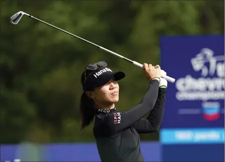  ?? DAVID J. PHILLIP — THE ASSOCIATED PRESS ?? Lydia Ko watches her tee shot on the 17th hole during a practice round Wednesday for The Chevron Championsh­ip in The Woodlands, Texas.