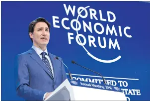  ?? CP PHOTO ?? Prime Minister Justin Trudeau addresses the World Economic Forum Tuesday, January 23, 2018 in Davos, Switzerlan­d. Trudeau says Canada and 10 other countries of the Trans-Pacific Partnershi­p have agreed to a revised trade agreement.