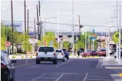  ?? ADOLPHE PIERRE-LOUIS/JOURNAL ?? Traffic moves along Central Avenue on Thursday as Mayor Tim Keller announced the end of major constructi­on on ART. The mayor is encouragin­g residents to shop and eat at businesses on Central.