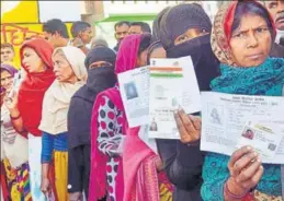  ??  ?? Women queue up at a polling booth in Amethi during the fifth phase of assembly elections in Uttar Pradesh on Monday. PTI PHOTO