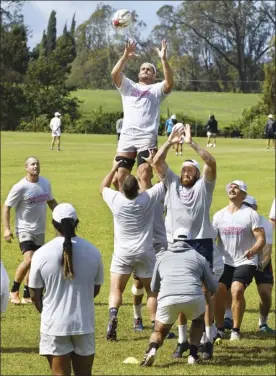  ?? The Maui News / MATTHEW THAYER photo ?? Los Angeles Giltinis lock Dave Dennis is lifted by teammates on a lineout during the Major League Rugby team’s practice last Tuesday in Olinda. The team, an MLR expansion team, wrapped up a monthlong training camp on Maui last week.