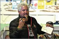  ?? TIMES-STANDARD FILE PHOTO ?? Columbus, Ohio, is removing a state of Christophe­r Columbus, but some residents say the city should take it a step further and change the city’s name to Flavortown, after Guy Fieri who was born there.