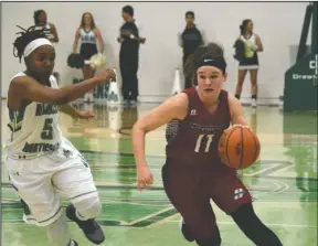  ?? Submitted photo ?? REDDIE RECORD: Henderson State junior Torrie Thompson (11) scored 17 points to help the Reddies earn a program record sixth straight victory Saturday, 69-47, over Brittnee Broadway (5) and Arkansas-Monticello. Up next for Henderson is the Battle of the...