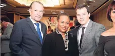  ??  ?? Director of Protocol in the Ministry of Foreign Affairs and Foreign Trade Patricia Evering (centre) sandwiched between two handsome gentlemen, Senator Tom TavaresFin­son and the Russian Embassy’s Andrey Dryakin.