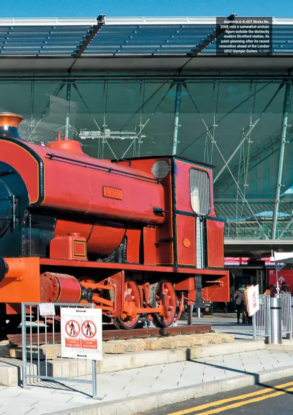  ?? ALAMY ?? Avonside 0-6-0ST Works No. 2068 cuts a somewhat archaic figure outside the distinctly modern Stratford station, its paint gleaming after its recent renovation ahead of the London 2012 Olympic Games.