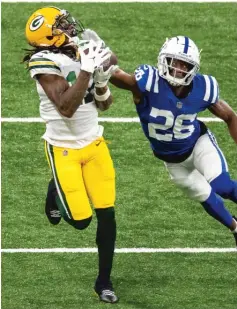  ?? ZACH BOLINGER/ AP ?? Receiver Davante Adams, Aaron Rodgers’ most reliable target, beats Colts cornerback Rock Ya- Sin on a deep throw last week.