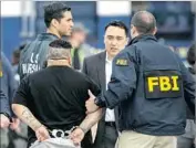  ?? Irfan Khan Los Angeles Times ?? ROUGHLY two dozen suspected members of the MS-13 gang were arrested across L.A. County in May.