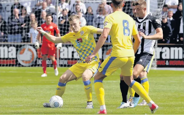  ?? Mike Petch ?? ●●Dan Cowan in action for County in their opening day defeat against Spennymoor Town