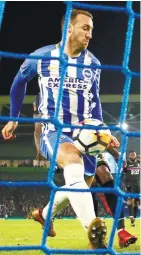  ??  ?? Brighton’s Glenn Murray scores his team’s second goal during yesterday’s FA Cup Third Round match against Crystal Palace at The American Express Community Stadium in Brighton. –