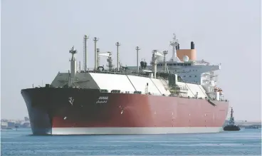  ?? AFP VIA GETTY IMAGES FILES ?? The Qatari Liquefied Natural Gas (LNG) carrier Duhail in the Suez Canal. Qatar on
Tuesday announced its first major deal to send liquefied natural gas to Germany.