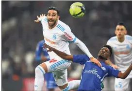  ?? (Photo AFP) ?? Adil Rami et ses partenaire­s ont longtemps mis les nerfs des fans de l’OM à rude épreuve... jusqu’à cette accélérati­on salutaire dans le money time.