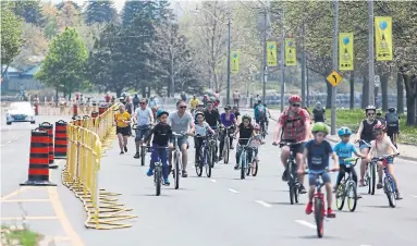  ?? RENÉ JOHNSTON TORONTO STAR FILE PHOTO ?? During the pandemic, the city has bowed to the anti-car crowd by shutting down several major roads on weekends to cars and trucks, writes Bob Hepburn, such as this stretch of Lake Shore Boulevard West.