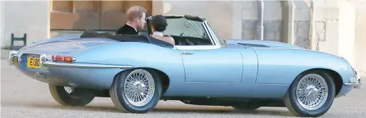  ??  ?? Just married: The E-type Jaguar bears a special number plate – E19051 – marking the date of the wedding