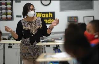  ?? ALAN DEP — MARIN INDEPENDEN­T JOURNAL ?? Third-grade teacher Christine Jones leads class on the first day of in-person school at Bayside Martin Luther King Jr. Academy in Marin City in 2020.