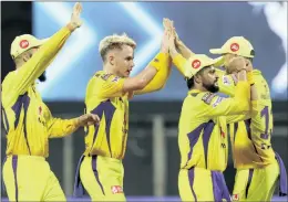  ?? — ANI Photo/IPL ?? Sam Curran of Chennai Super Kings celebrates the wicket of Sanju Samson at the Wankhede Stadium in Mumbai on Monday.