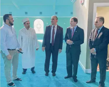  ?? Austin Mirmina/Hearst Connecticu­t Media ?? U.S. Sen. Richard Blumenthal, second from right, speaks with leaders of the Diyanet Mosque of New Haven Friday.