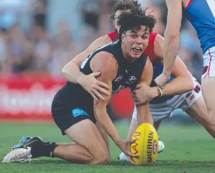  ?? ?? Elijah Hollands in action during an AFL Community Series match between Carlton and Melbourne last month. Picture: Getty