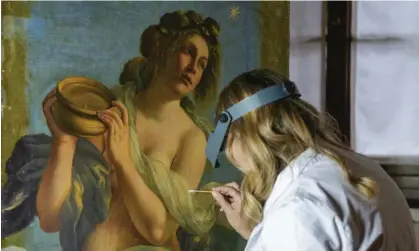  ?? Photograph: Andrew Medichini/AP ?? Art restorer Elizabeth Wicks works on Artemisia Gentilesch­i’s Allegory of Inclinatio­n in the Casa Buonarroti museum in Florence, Italy.
