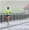  ??  ?? A hardy runner in Arbroath and a skidding car in Dundee.